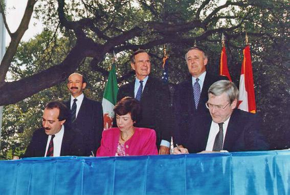 1988 nafta signing with Bush and PM.jpg
