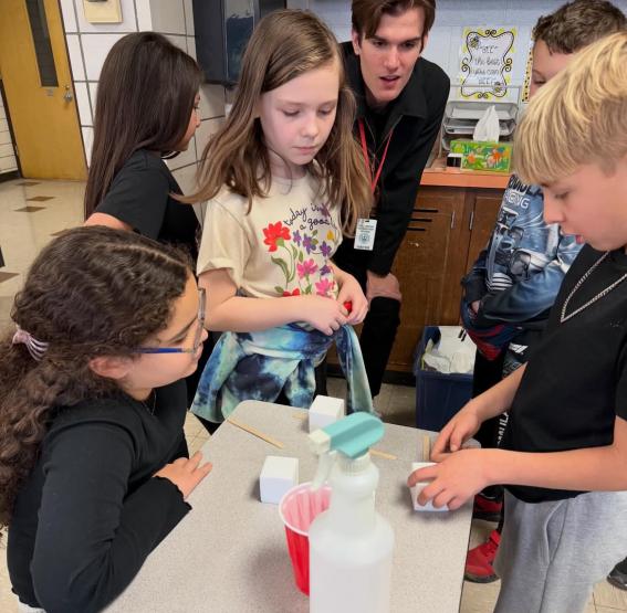 Connor with students